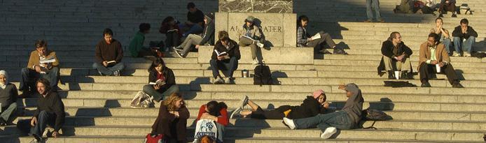students sitting on Low Library steps